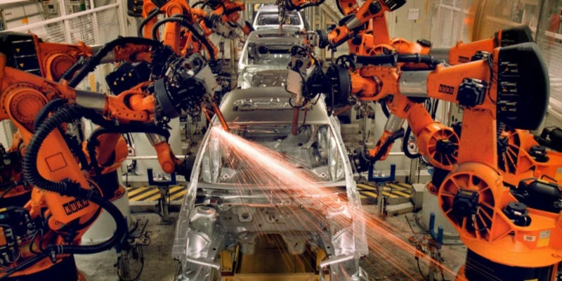 Automatic industrial robotic arm welding vehicle body frame in intelligent automobile manufacturing workshop
