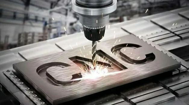 CNC milling machine cutting metal workpiece with cutting tool, high precision metal engraving and machining process with flying sparks